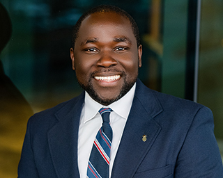 Headshot of Ade Adegun, Southern First banker.