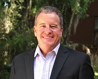 Headshot of Doug Barnett Barnett