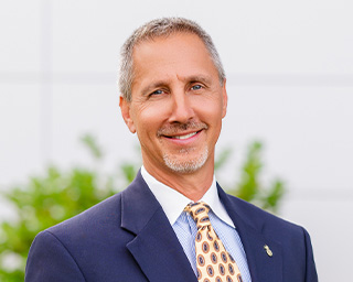 Headshot of Greg McCoy, Southern First Banker.