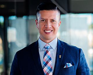 Headshot of Juan Carlos Villalobos, Southern First banker.