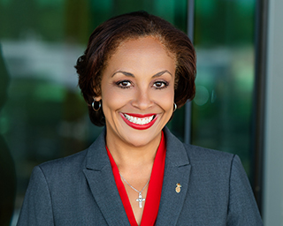 Headshot of Kim Macklanburg, Director of Community Partnerships, SVP.