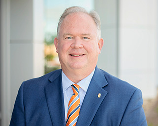 Headshot of Tom Bennett Bennett