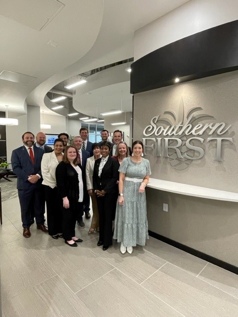 Group photo of bankers in Southern First's Greensboro office.