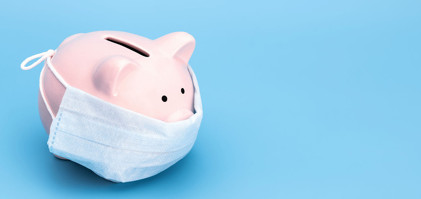 Piggy bank wearing a mask on a blue background.